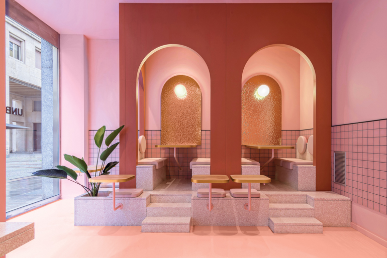 inside Bun Burger, a millennial-pink restaurant in Turin, Italy by Masquespacio