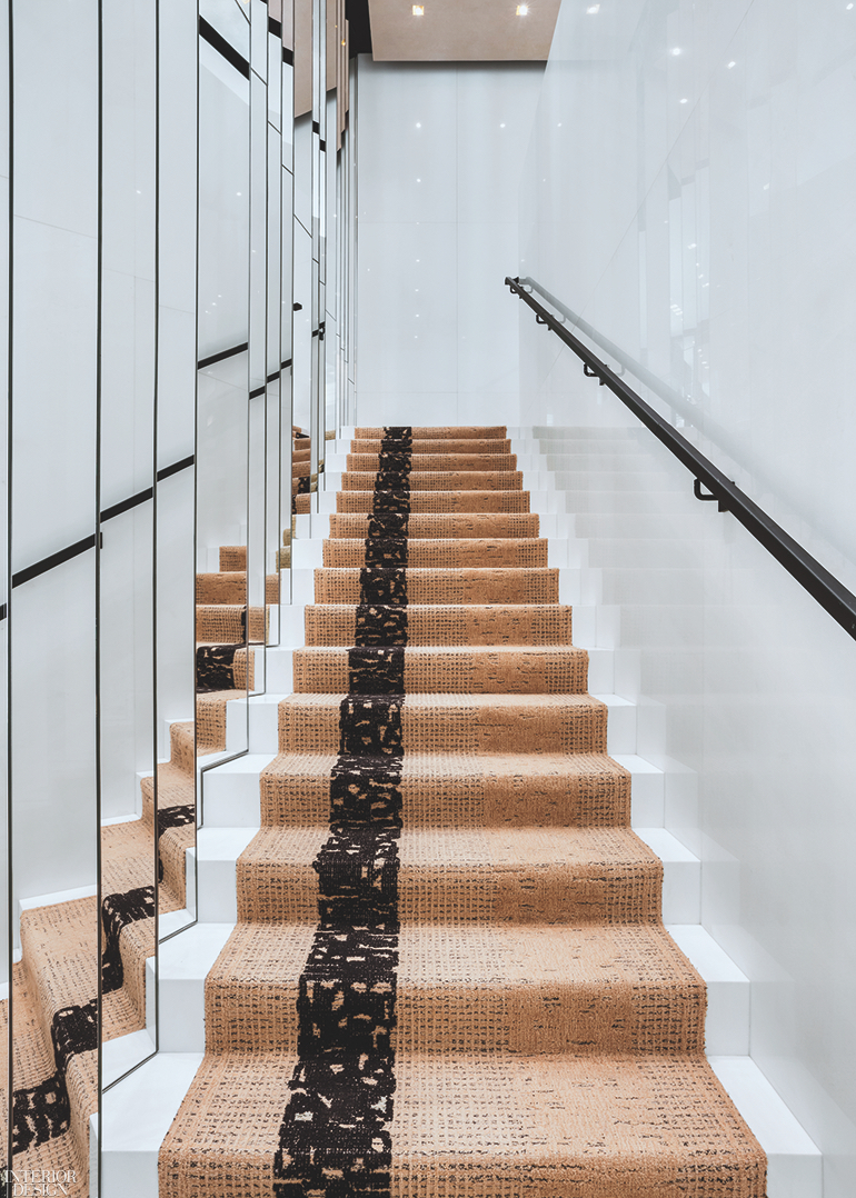 a runner goes up the stairs in Chanel's Istanbul store