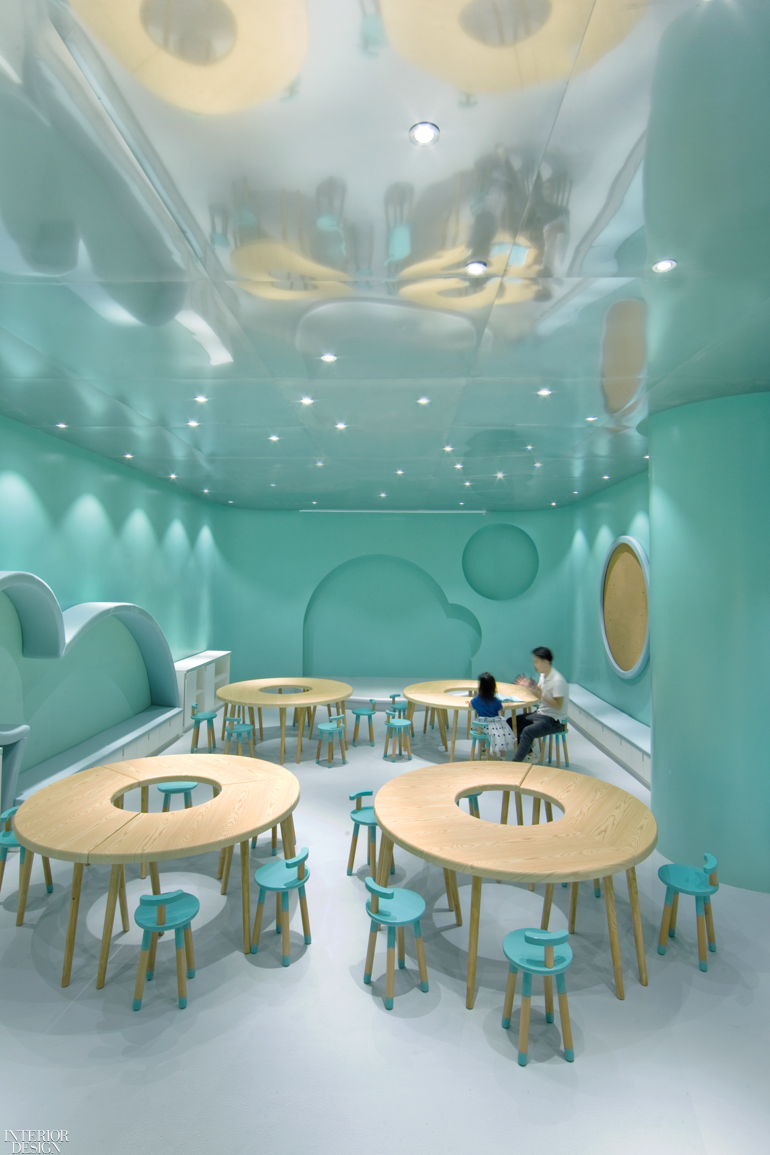 a kids bookshop with blue-green pastel interiors