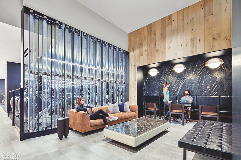 the lounge inside Equinox L.A. with wood panels and a semi-transparent partition