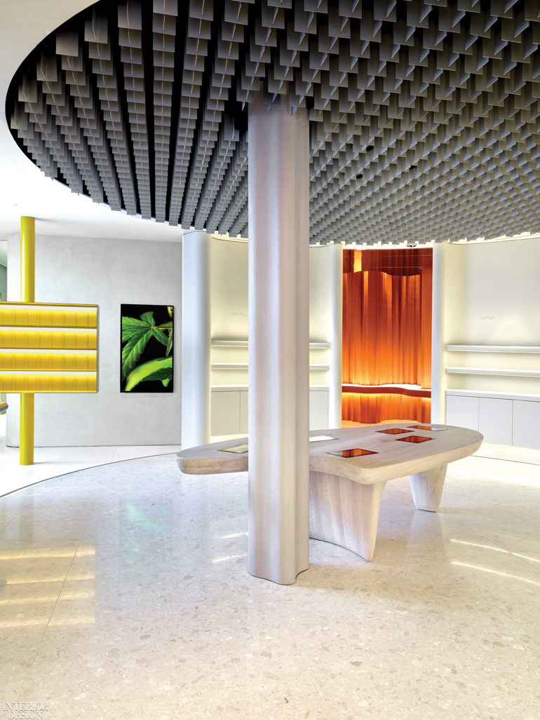 a black ceiling hangs above a desk in a brightly lit room of a Toronto cannabis retail shop