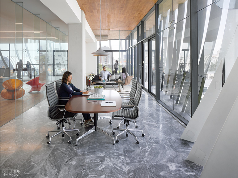 Aluminium strips curve through Mexico City building by Belzberg