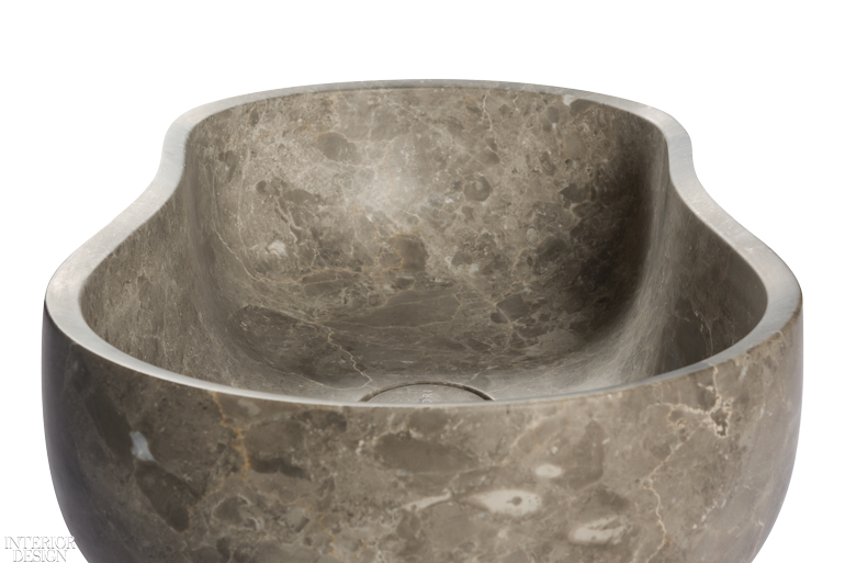 a marble countertop sink that resembles molded clay