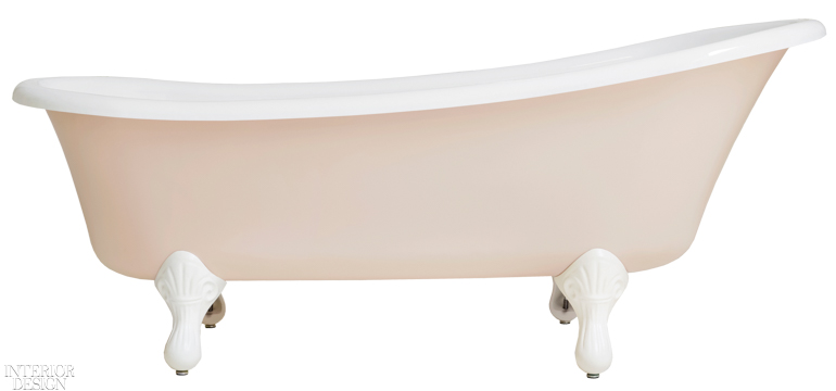 a pastel pink standalone bath tub with slipper feet