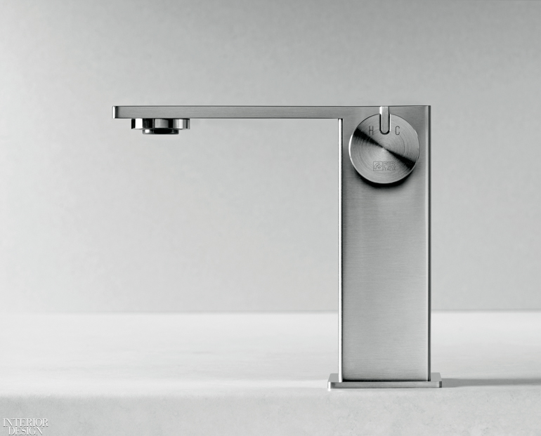 a stainless steel faucet with a thin silhouette